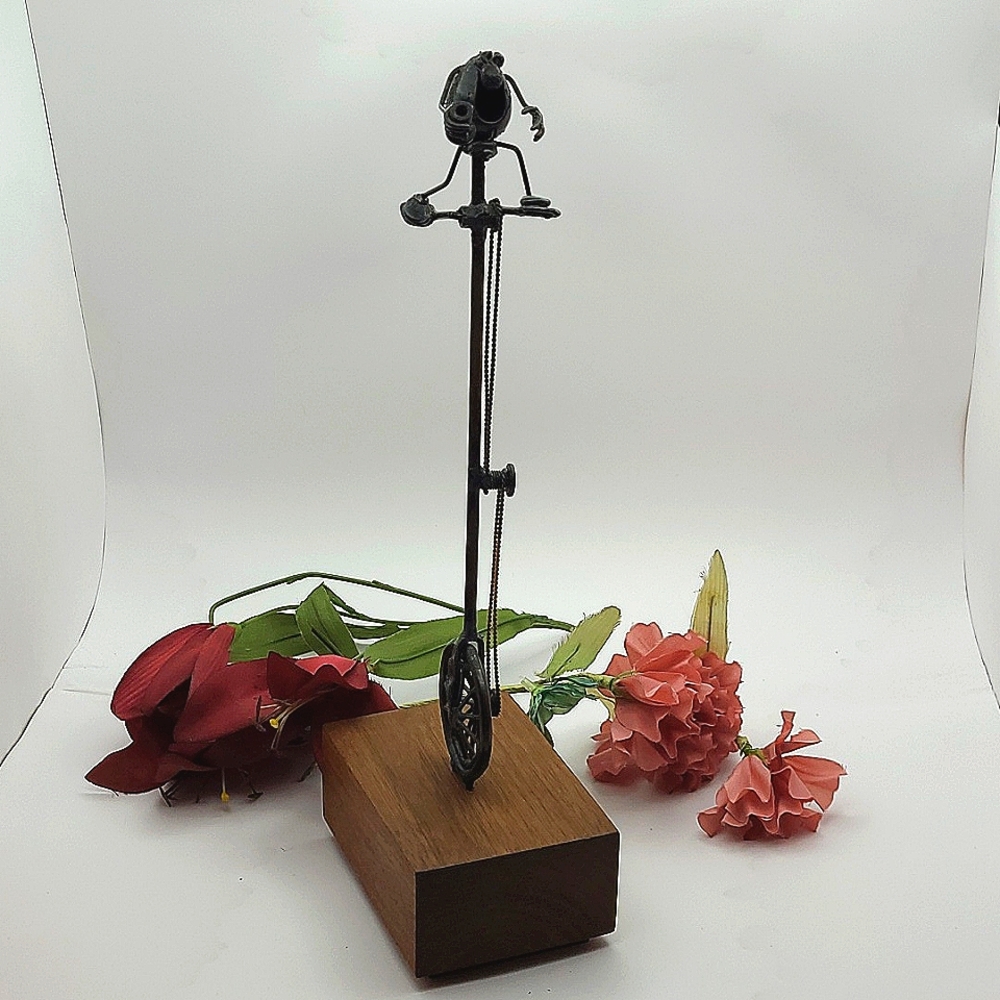 Vintage Greg and Jeff Quayle original flea unicycle sculpture